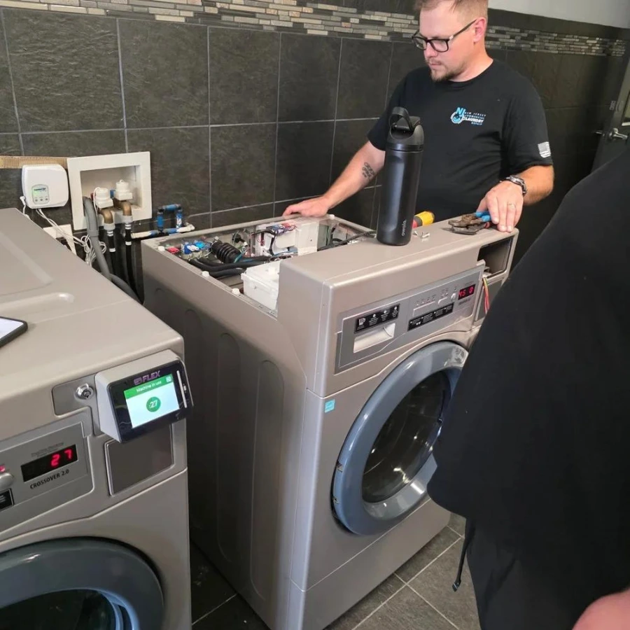 Stacked washer and dryer units